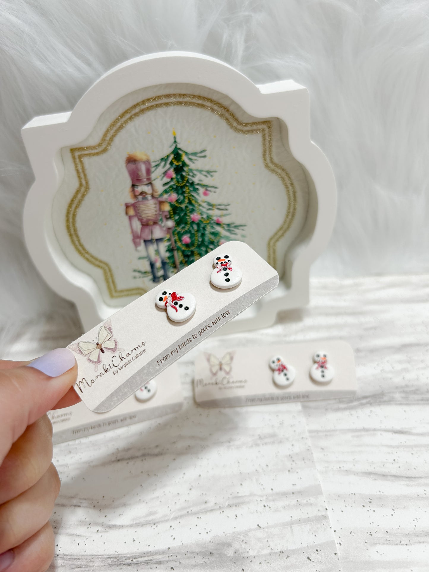 Snow man stud earrings