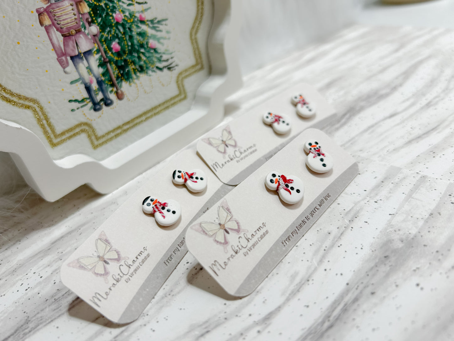 Snow man stud earrings